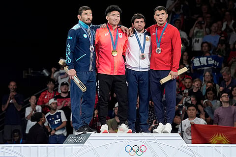 Paris Olympics men's Greco-Roman 77kg wrestling: Kazakhstan's Demeu Zhadrayev, silver, Japan's Nao Kusaka, gold, Armenia's Malkhas Amoyan, Kyrgyzstan's Akzhol Makhmudov, bronze